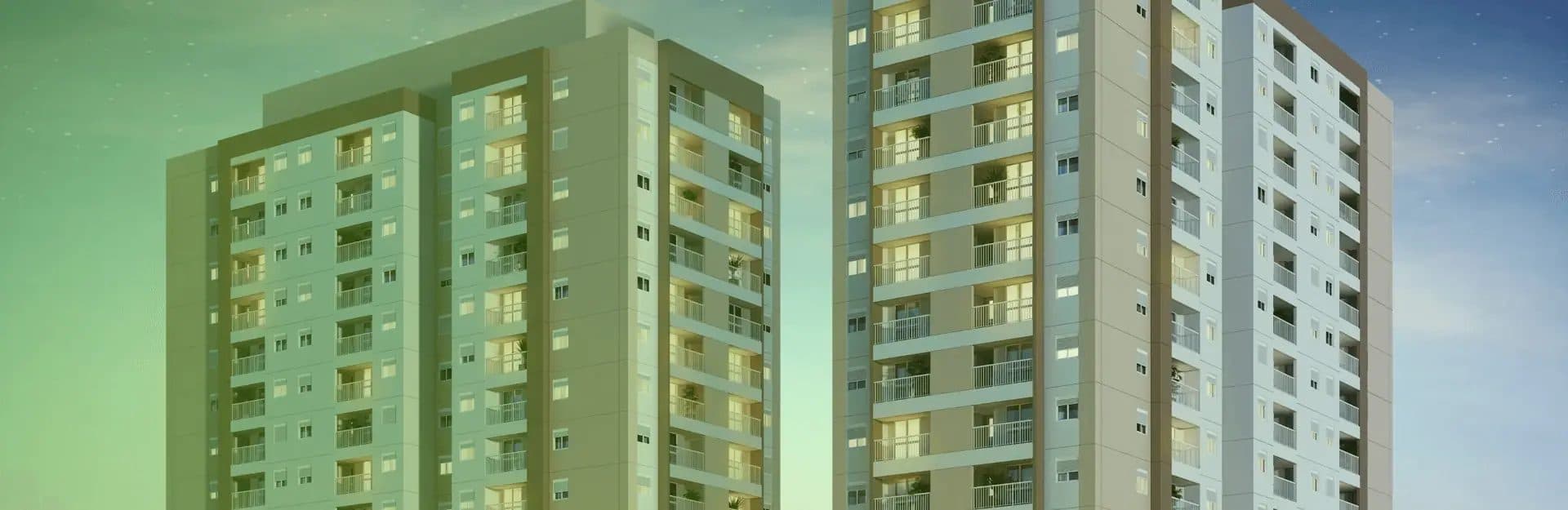 Fachada de edifícios residenciais com varandas e iluminação noturna.